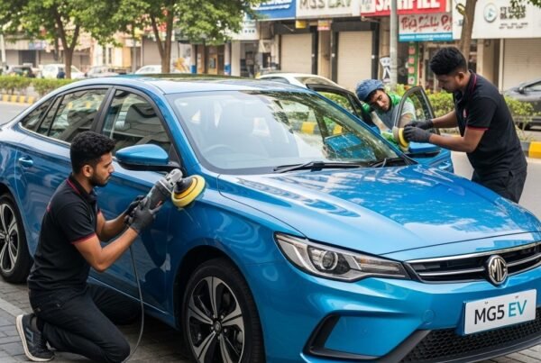 MG5 EV electric sedan professionally detailed by two technicians on a Karachi street at Bulao.pk.