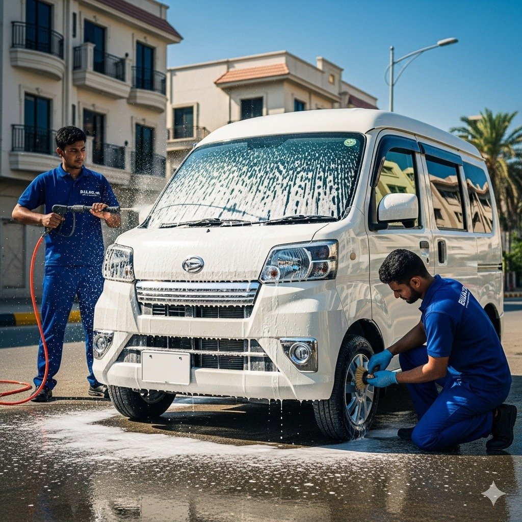 Professional car detailers cleaning a white Daihatsu Hijet compact van with foam wash and microfiber cloths, showcasing exterior detailing and wheel cleaning in a bright, realistic setting.